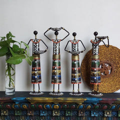 THE KUTIR Metal Set of 4 Rajasthani Tribal Majdoor Ladies Hand-Painted Tea Light Holder Cum Showpiece Black