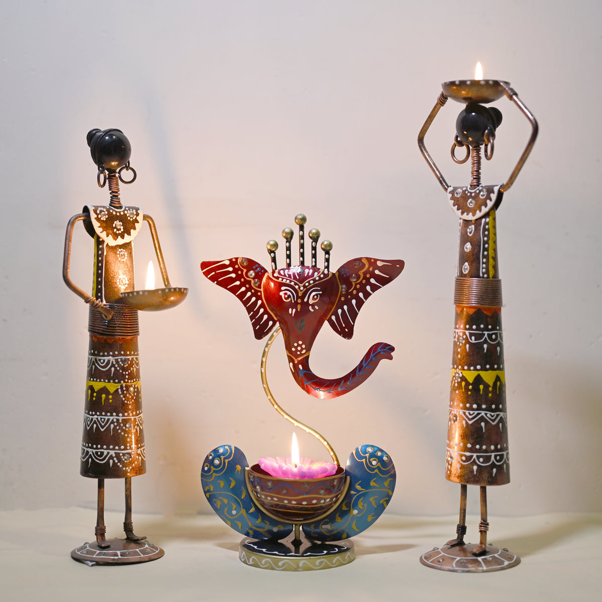 Handicrafted Labour Lady T-Lite pair with Ganesh T-Lite Combo (3 Pcs)